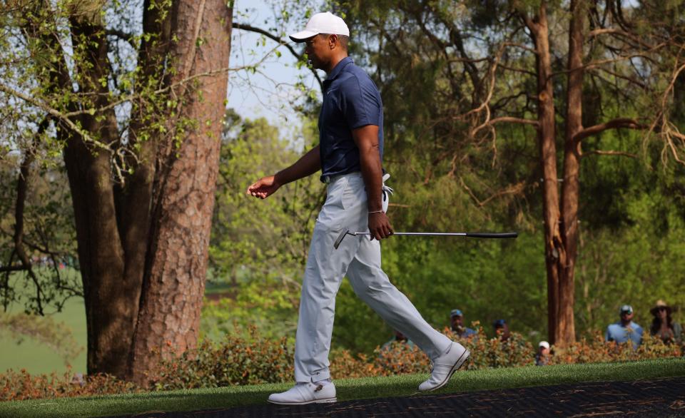 Those aren't Nikes on Tiger Woods' feet. (Reuters/Brian Snyder)