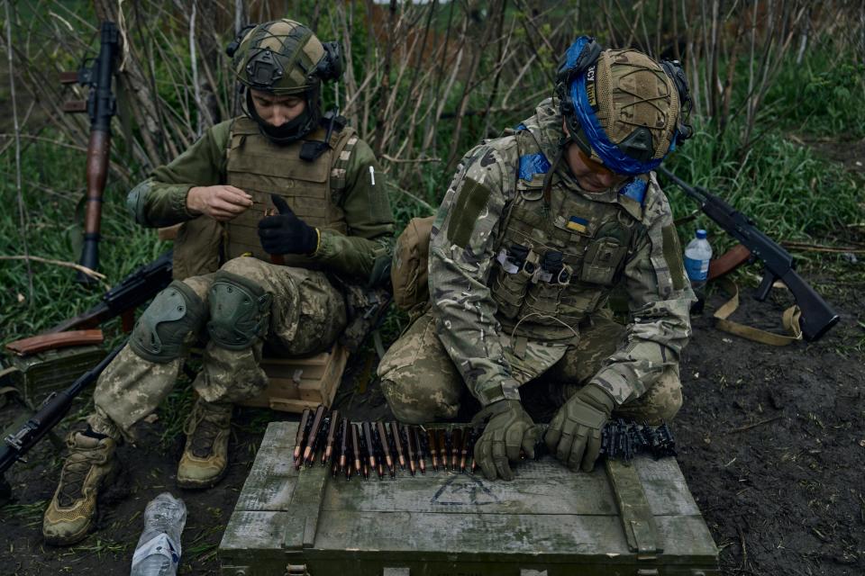 Ukrainian soldiers prepare their ammunition at the frontline positions near Vuhledar (Copyright 2023 The Associated Press. All rights reserved.)