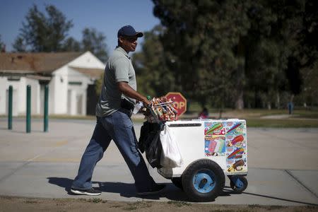 Teo Gonzales, 35, works as a street vendor in Griffith Park, Los Angeles, California, United States, June 25, 2015. REUTERS/Lucy Nicholson