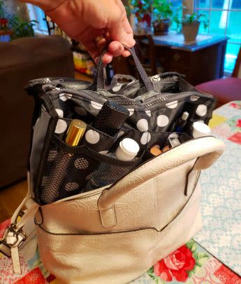 A handbag organizer insert with lots of pockets