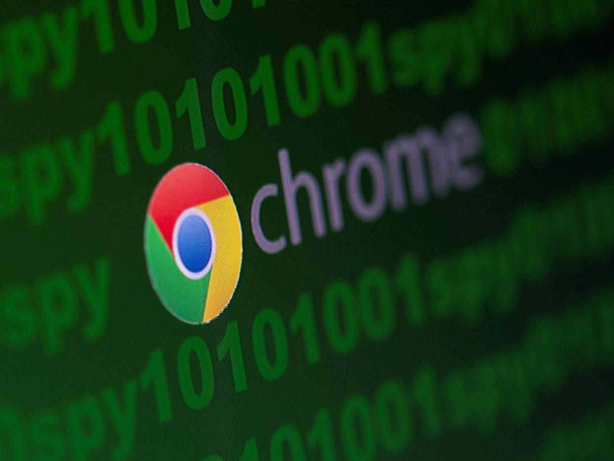 FILE PHOTO: Google Chrome logo is seen near cyber code and words "spy"  in this illustration picture taken June 18, 2020. REUTERS/Dado Ruvic/Illustration