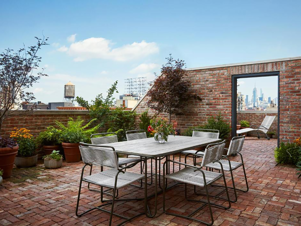 The Nine Orchard’s terrace has a spectacular view of the NYC skyline (Booking.com)