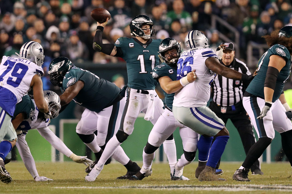 PHILADELPHIA, PENNSYLVANIA - DECEMBER 22: Carson Wentz #11 of the Philadelphia Eagles throws a pass during the first half against the Dallas Cowboys in the game at Lincoln Financial Field on December 22, 2019 in Philadelphia, Pennsylvania. (Photo by Patrick Smith/Getty Images)