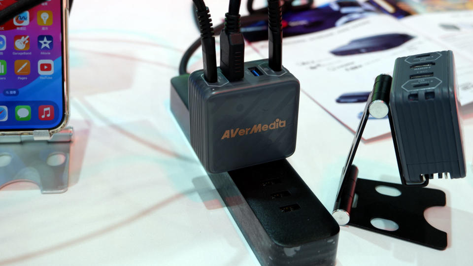 Photo of the Avermedia Premium Go series of GaN chargers, with HDMI 4K output, USB hub, and 1080p capture in the Elite Go