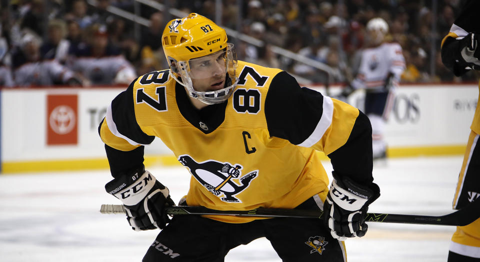 Pittsburgh Penguins' Sidney Crosby prepares to take a face-off during the second period of an NHL hockey game against the Edmonton Oilers in Pittsburgh, Sat., Nov. 2, 2019. (AP Photo/Gene J. Puskar)