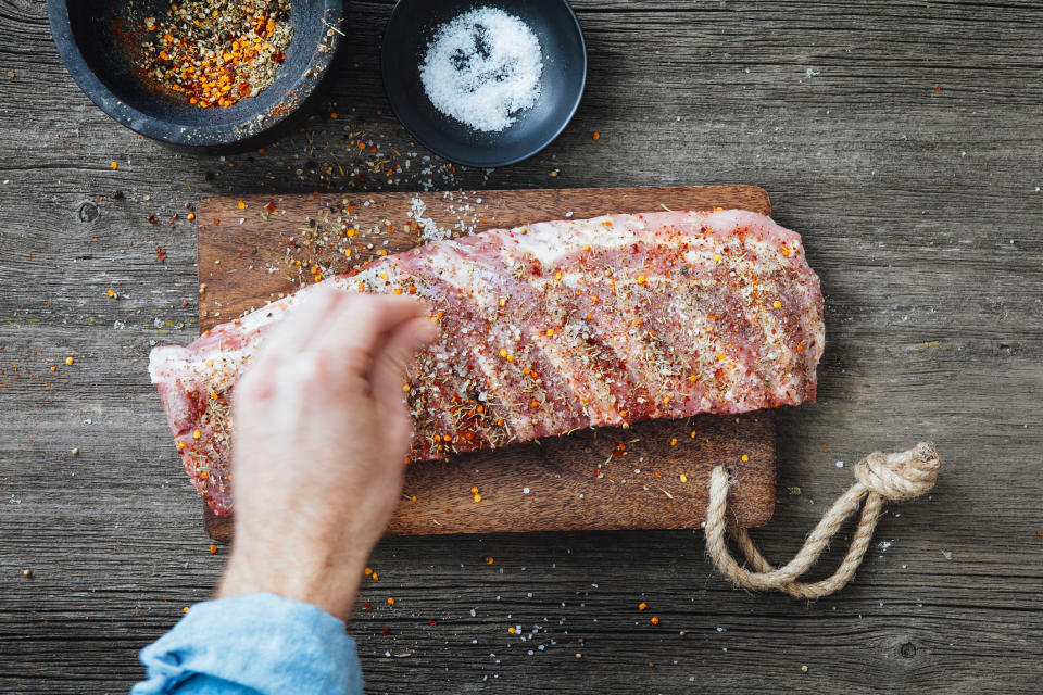 Salting and seasoning ribs