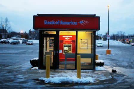 A Bank of America ATM kiosk sits in a parking lot in Medford, Massachusetts, U.S. January 10, 2017. REUTERS/Brian Snyder - RTX2YE27