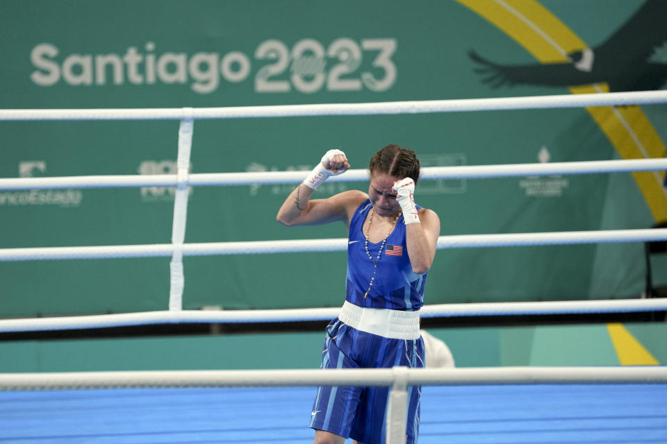 Jennifer Lozano of the United States celebrates her victory over Canada's Mckenzie Wright in a women's boxing 50kg semifinal bout at the Pan American Games in Santiago, Chile, Thursday, Oct. 26, 2023. (AP Photo/Dolores Ochoa)