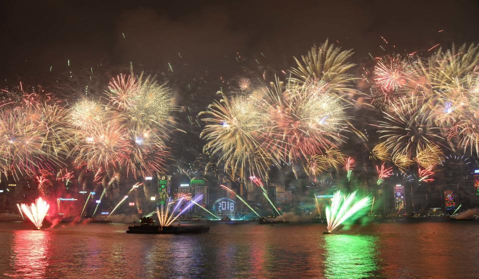 Fireworks explode over Victoria Harbour on New Year's Eve in Hong Kong, China. (Photo: VCG via Getty Images)