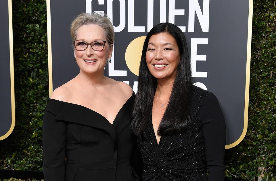 Meryl with the director of the National Domestic Workers Alliance, Ai-jen Poo. Copyright: [Rex]