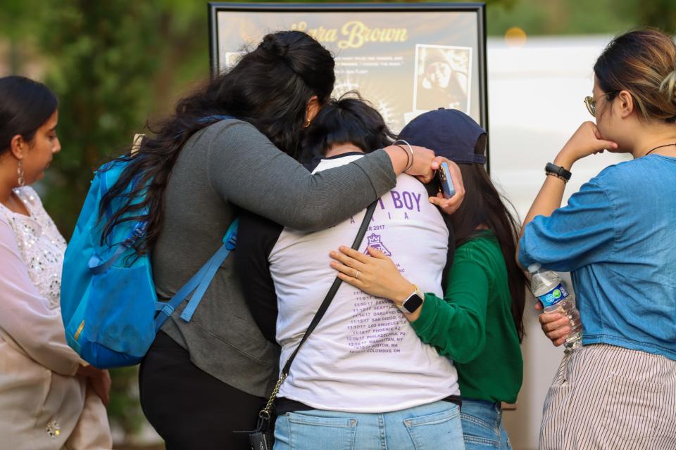 Students gather at a vigil in remembrance for Sara Brown on Tuesday, Aug. 29 2023, at Purdue University in West Lafayette, Ind. Brown, a Purdue graduate student, was killed Aug. 24, 2023, in a vehicle accident.