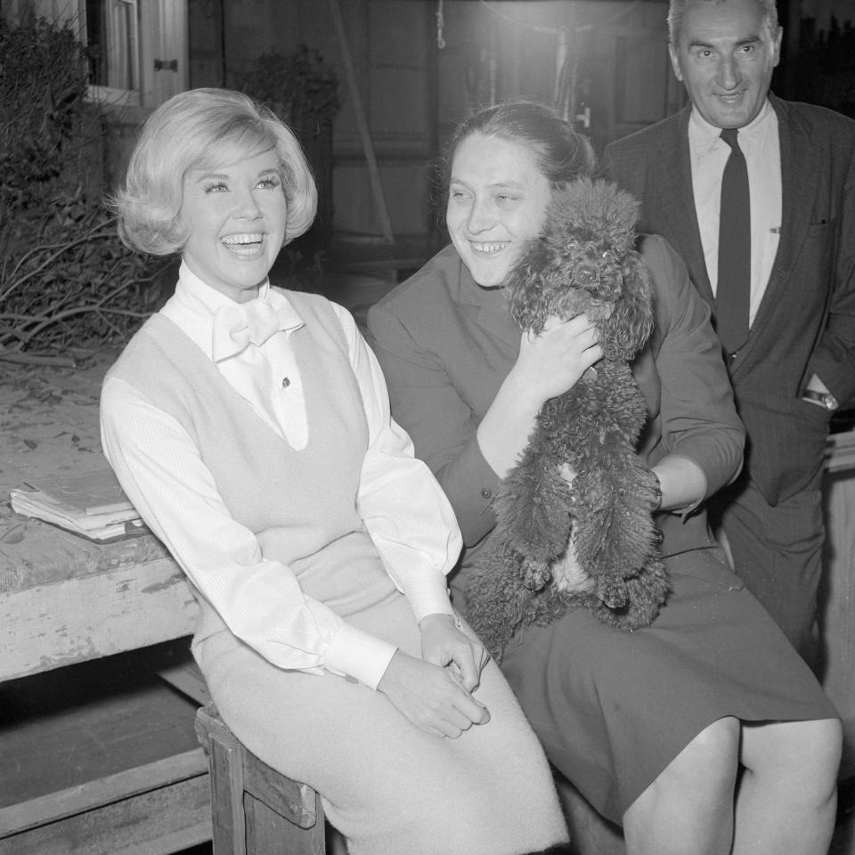 With Doris Day and the actress's poodle during a visit to 20th Century Fox studios in 1965 - Bettmann