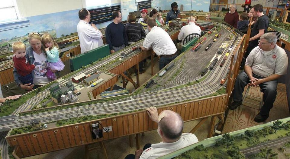 An overall view of the elaborate HO gauge model railroad display during a previous open house held by the Metro East Model Railroad Club. The club members are there to answer questions, and oversee train operations, which includes multiple trains running around the tracks simultaneously. The next open house will be held on Friday and Saturday, June 16 and 17, in conjunction with the Glen Carbon Homecoming. For more information about the club, or to join, go to their website at www.trainweb.org/memrc/ or call 254-6596.