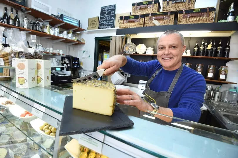 Mark Moss from Birkdale Cheese Co pictured with 8 Blumen Swiss Alpine cheese