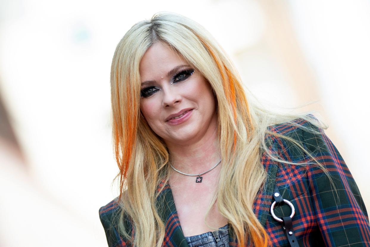 Canadian singer-songwriter Avril Lavigne attends a ceremony to unveil her Hollywood Walk of Fame Star in Hollywood, California, on August 31, 2022. (Photo by VALERIE MACON / AFP) (Photo by VALERIE MACON/AFP via Getty Images)