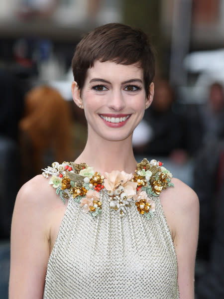 Anne Hathaway had long, flowing brunette hair before she had to cut it all off for he role as Fantine in the upcoming movie "Les Miserables." The short, pixie 'do really highlights her beautiful face. (Photo by Mike Marsland/WireImage)