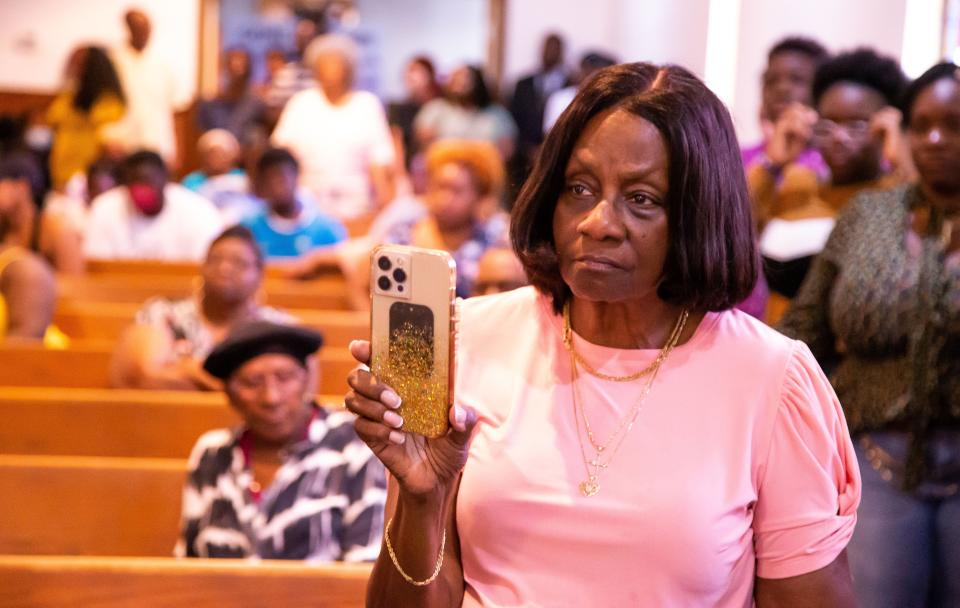 A large group gathered during a press conference held at the New St. John Missionary Baptist Church Monday afternoon June 5, 2023, by Attorney Anthony Thomas who is representing the family and the victim Ajike Shantrell Owens. The shooting took place last Friday when a woman shot through her front door killing another woman at Quail Run, a housing complex located off County Road 475A, not far from County Road 484, in Ocala, FL. The victim was identified as Ajike Shantrell Owens. No one has been arrested. [Doug Engle/Ocala Star Banner]2023