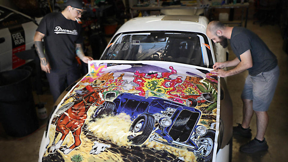 The team at Paint Protection Fanatics expertly wrapping the Porsche with 3M film printed by Thumbprint Digital. - Credit: Photo: Courtesy of Brooke DeBoer, Aaron Kahan and AutoMoto.