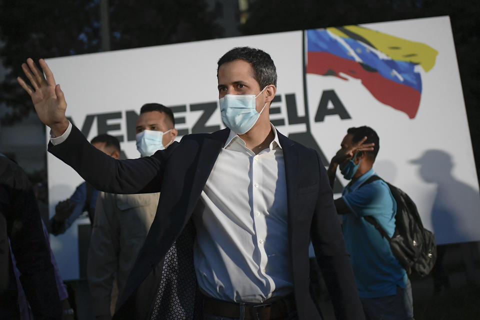 FILE - In this Nov. 12, 2020, file photo, opposition leader Juan Guaido arrives to the "Venezuela raises its voice" campaign rally in the Terrazas del Avila neighborhood of Caracas, Venezuela. Guaido's opposition coalition is boycotting the upcoming Dec. 6 vote. (AP Photo/Matias Delacroix, File)