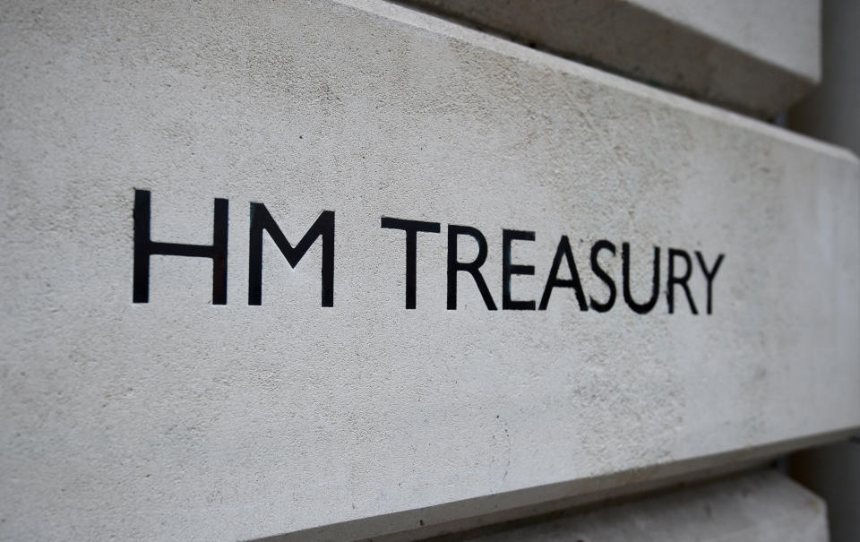A view of signage for HM Treasury in Westminster, London.