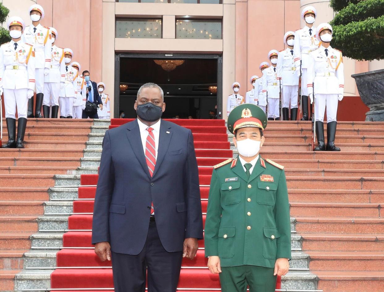 U.S Defense Secretary Lloyd Austin and Vietnamese Defense Minister Phan Van Giang stand for a photo in Hanoi, Vietnam (AP)