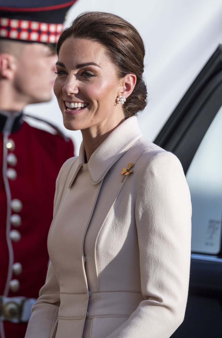 <p>Of course, you don't need a hat to make a low bun look effortlessly elegant. Consider Kate's look at a Horse Guards Parade on June 6, 2019 in London.</p>