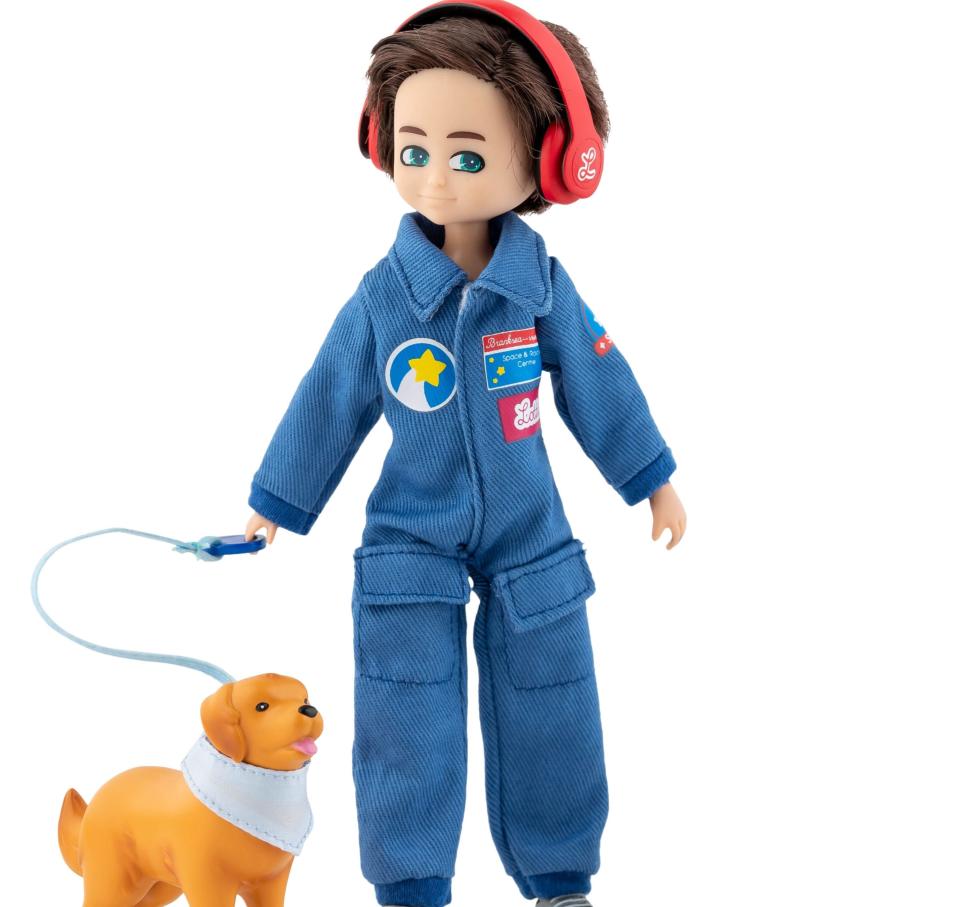 The Lottie Dolls play set inspired by a real boy with autism includes  headphones and sunglasses to assist with sensory issues and a companion dog.