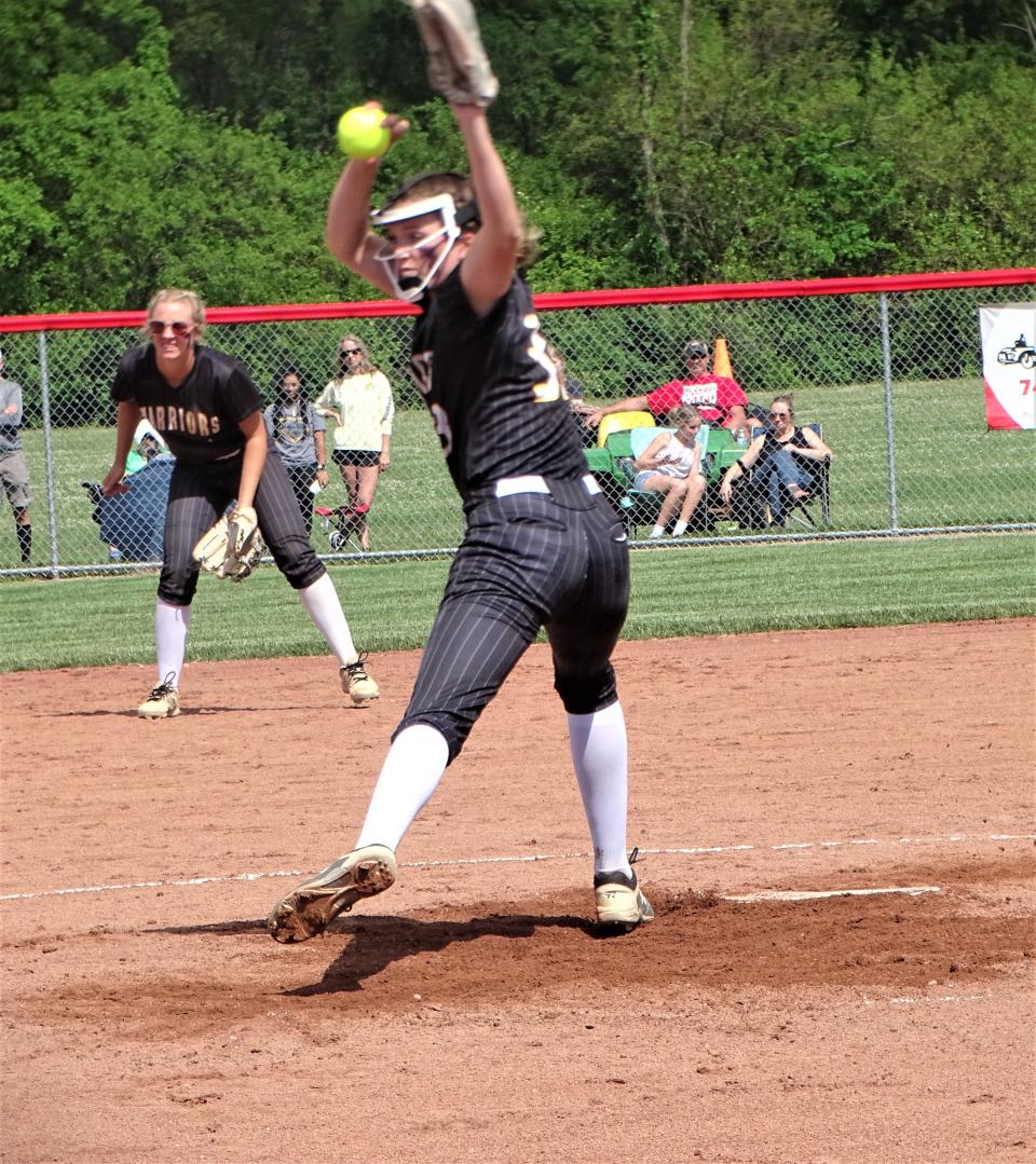 Watkins Memorial sophomore pitcher Carsyn Cassady prepares to deliver the plate against Lancaster during Saturday's Division I regional final at Centerburg. The Warriors won, 3-1.