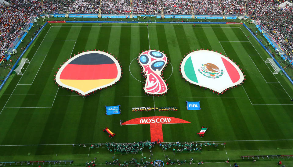 General view as the players line up during the national anthems before the match.