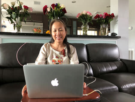 Vietnamese dissident Nguyen Ngoc Nhu Quynh, who goes by the pen name Mother Mushroom, speaks with a reporter during a video conference on her laptop computer in Houston, Texas, October 19, 2018. Courtesy of Chi Dang/Handout via REUTERS