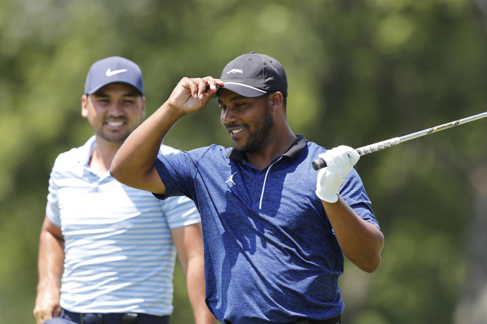 Harold Varner III prepares to hit his tee shot on the 15th hole during a nine-hole exhibition ahead of the Rocket Mortgage Classic golf tournament, Wednesday, July 1, 2020, at the Detroit Golf Club in Detroit. (AP Photo/Carlos Osorio)