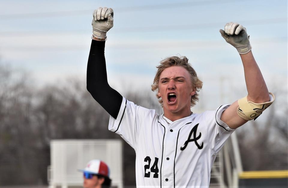 Abilene High's Beckham Paul celebrates after hitting an RBI triple in the first inning against Lubbock Monterey.