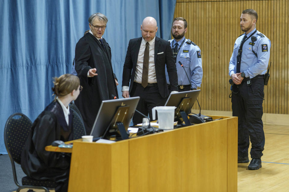 Anders Behring Breivik, center, arrives as the Oslo district court conducts his case in a gymnasium at Ringerike prison, in Ringerike, Norway, Monday, Jan. 8, 2024. Breivik, who slayed 77 people in an anti-Islamic bomb and gun rampage in 2011, appeared in court on Monday in a bid to sue the Norwegian state for breaching his human rights. Norway’s worst peacetime killer says his solitary confinement since being jailed in 2012 amounts to inhumane treatment under the European Convention of Human Rights. (Cornelius Poppe/NTB Scanpix via AP)