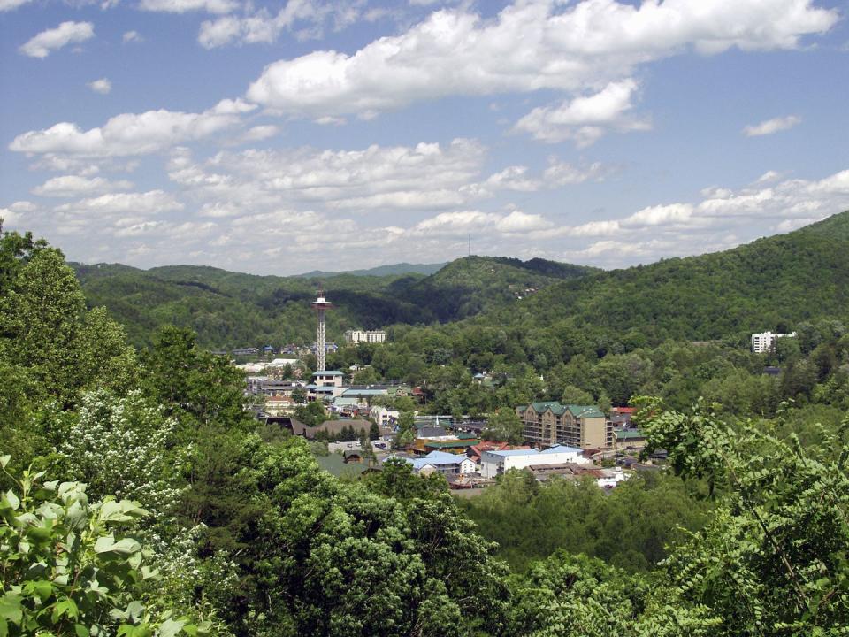 <p>The gateway to the Great Smoky Mountains National Park has a rustic charm that makes it an attraction in itself. There's the usual cute shopping you'll find in a tourist hot spot, but there are also a few unusual things to do: You can take a trip up the 407-foot Space Needle observation tower or take in views from the <a href="http://www.gatlinburgskylift.com/" rel="nofollow noopener" target="_blank" data-ylk="slk:Sky Lift;elm:context_link;itc:0;sec:content-canvas" class="link ">Sky Lift</a>.</p><p><a href="https://www.housebeautiful.com/design-inspiration/house-tours/a4297/18th-century-spanish-style-castle-in-tennessee/" rel="nofollow noopener" target="_blank" data-ylk="slk:Look inside a castle in Tennessee »;elm:context_link;itc:0;sec:content-canvas" class="link "><em>Look inside a castle in Tennessee »</em></a></p>