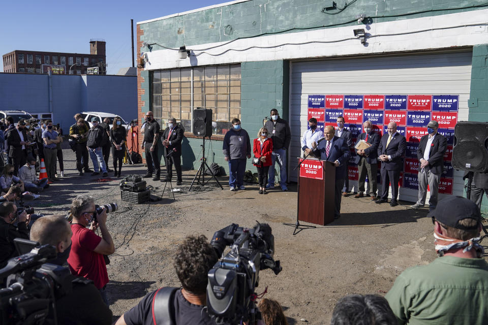 FILE - Former New York mayor Rudy Giuliani, a lawyer for President Donald Trump, speaks during a news conference at Four Seasons Total Landscaping on legal challenges to vote counting in Pennsylvania, Nov. 7, 2020, in Philadelphia. A review panel says Giuliani should be disbarred in Washington for how he handled litigation challenging the 2020 election on behalf of then-President Donald Trump. The panel's report was released Friday, July 7, 2023. (AP Photo/John Minchillo, File)