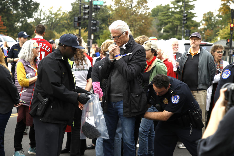 WASHINGTON, DC - OCTOBER 25: Actor Ted Danson is arrested during the "Fire Drill Friday" Climate Change Protest on October 25, 2019 in Washington, DC . Protesters demand Immediate Action for a Green New Deal. Clean renewable energy by 2030, and no new exploration or drilling for Fossil Fuels.  (Photo by John Lamparski/Getty Images)