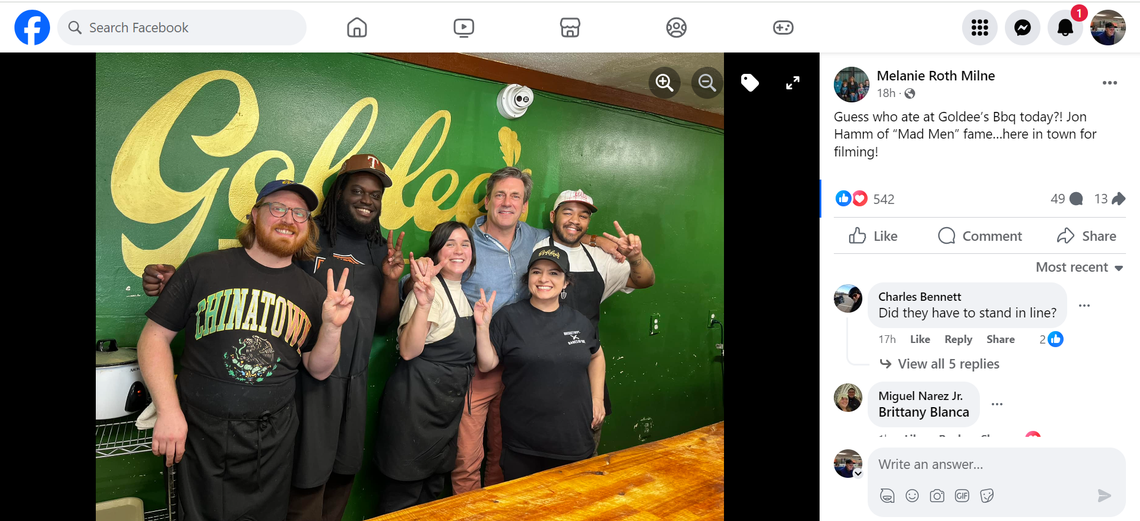 Actor Jon Hamm poses for a photo with staff at Goldee’s Barbecue in Fort Worth.