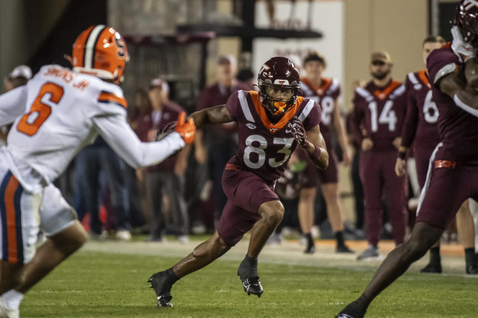 Virginia Tech's Kyle Lowe (83) runs after a reception during the first half of the team's NCAA college football game against Syracuse on Thursday, Oct. 26, 2023, in Blacksburg, Va. (AP Photo/Robert Simmons)