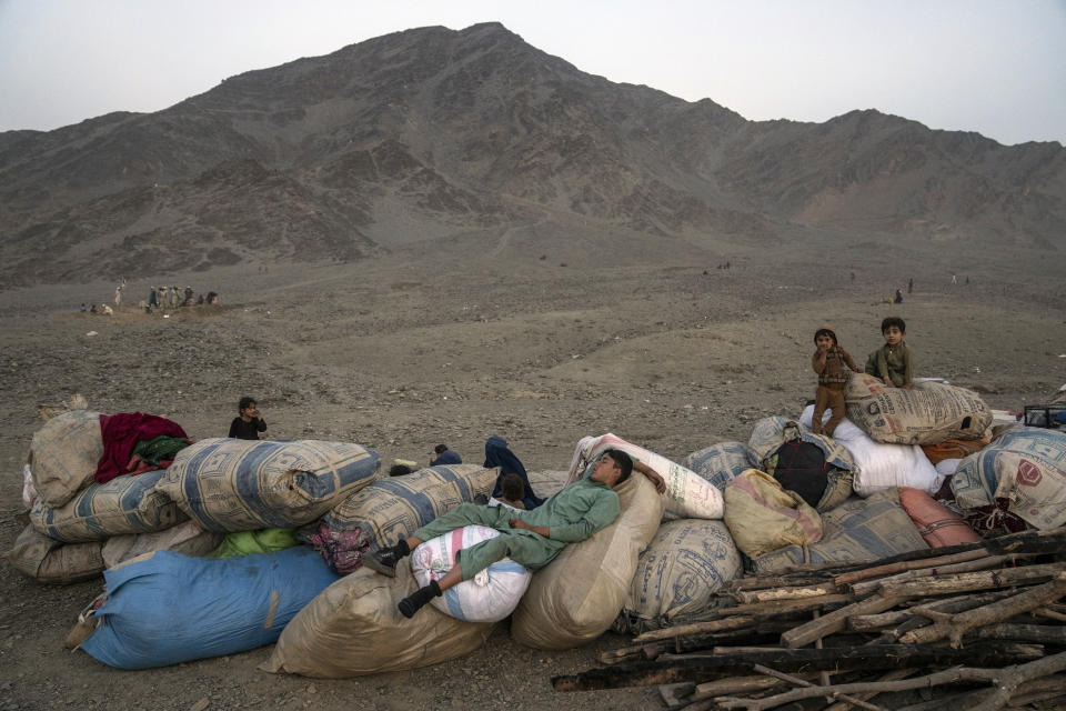 Afghan refugees settle in a camp near the Torkham Pakistan-Afghanistan border, in Torkham, Afghanistan, Friday, Nov. 3, 2023. A huge number of Afghan refugees entered the Torkham border to return home hours before the expiration of a Pakistani government deadline for those who are in the country illegally to leave or face deportation. (AP Photo/Ebrahim Noroozi)