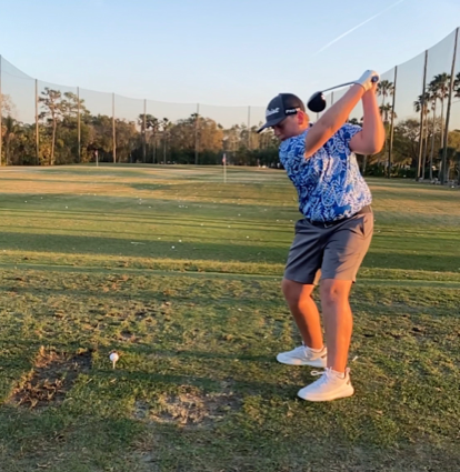 Carson Perry, coiled and ready to release the driver during a range session at Crane Lakes in Port Orange.