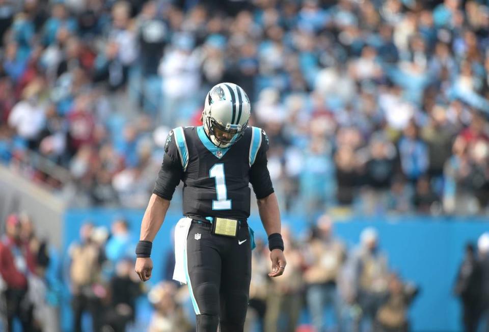 Carolina Panthers quarterback Cam Newton walks across the field Sunday during the team’s 27-21 loss. Newton completed 21 of 27 passes for 189 yards, but Carolina dropped to 5-6.