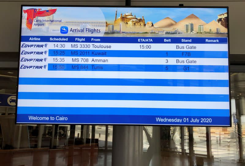 An arrivals board is pictured at the Cairo's International Airport after its reopening, following the outbreak of the coronavirus disease (COVID-19), in Cairo