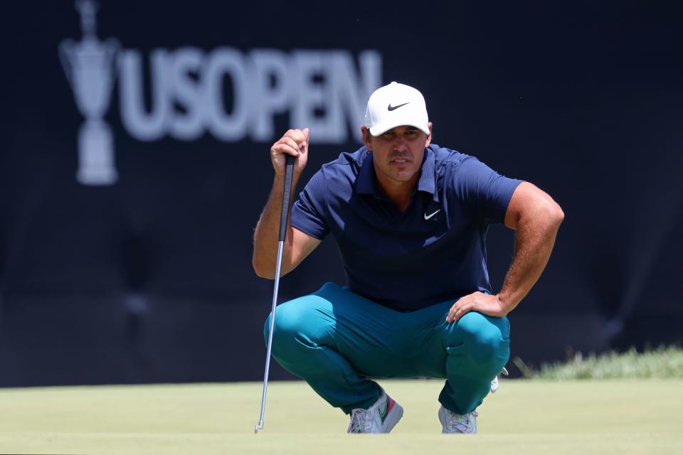 Jun 16, 2023;  Los Angeles, California, USA;  Brooks Koepka (LIV player) lines up a putt on the ninth green during the second round of the US Open golf tournament.  Mandatory Credit: Kiyoshi Mio-USA TODAY Sports