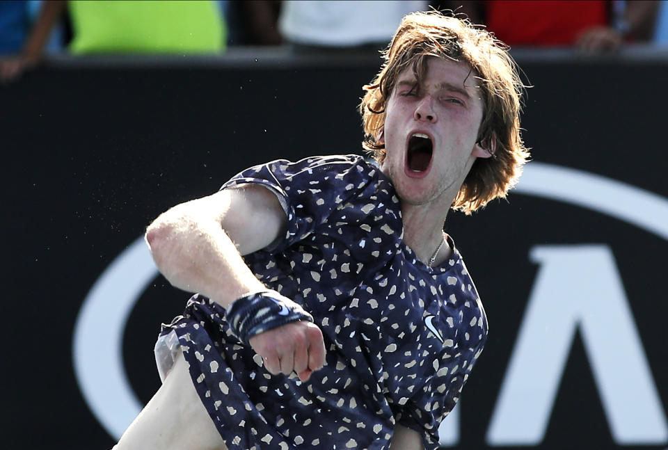 Russia's Andrey Rublev celebrates after defeating Belgium's David Goffin in their third round singles match at the Australian Open tennis championship in Melbourne, Australia, Saturday, Jan. 25, 2020. (AP Photo/Andy Wong)