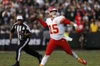 Dec 2, 2018; Oakland, CA, USA; Kansas City Chiefs quarterback Patrick Mahomes (15) throws a pass against the Oakland Raiders in the third quarter at Oakland Coliseum. Mandatory Credit: Cary Edmondson-USA TODAY Sports