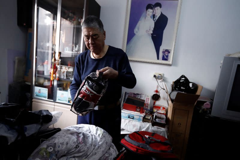 The Wider Image: On a frozen pond far from the Olympics, meet China's ice hockey veterans