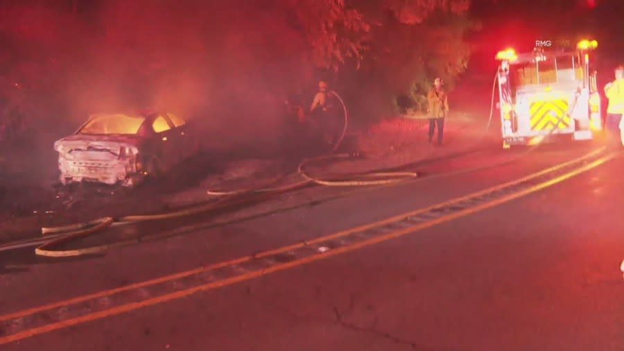Police are searching for the driver of a vehicle that crashed and started a small brush fire in Malibu early Saturday, July 27, 2024. (RMGNews)