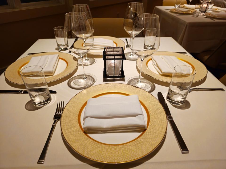 A handsome place setting at each seat awaits diners at Oak Park.