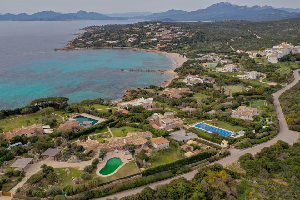 An aerial view of one of Russian oligarch Alisher Usmanov's prestigious villas on the Costa Smeralda in Sardinia hit by EU economic sanctions. Italian authorities have seized several villas and yachts owned by wealthy Russians targeted by EU sanctions in the wake of Russia's invasion of Ukraine. (Photo by Contributor/Getty Images)