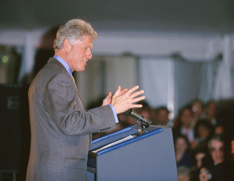 Clinton speaking onstage